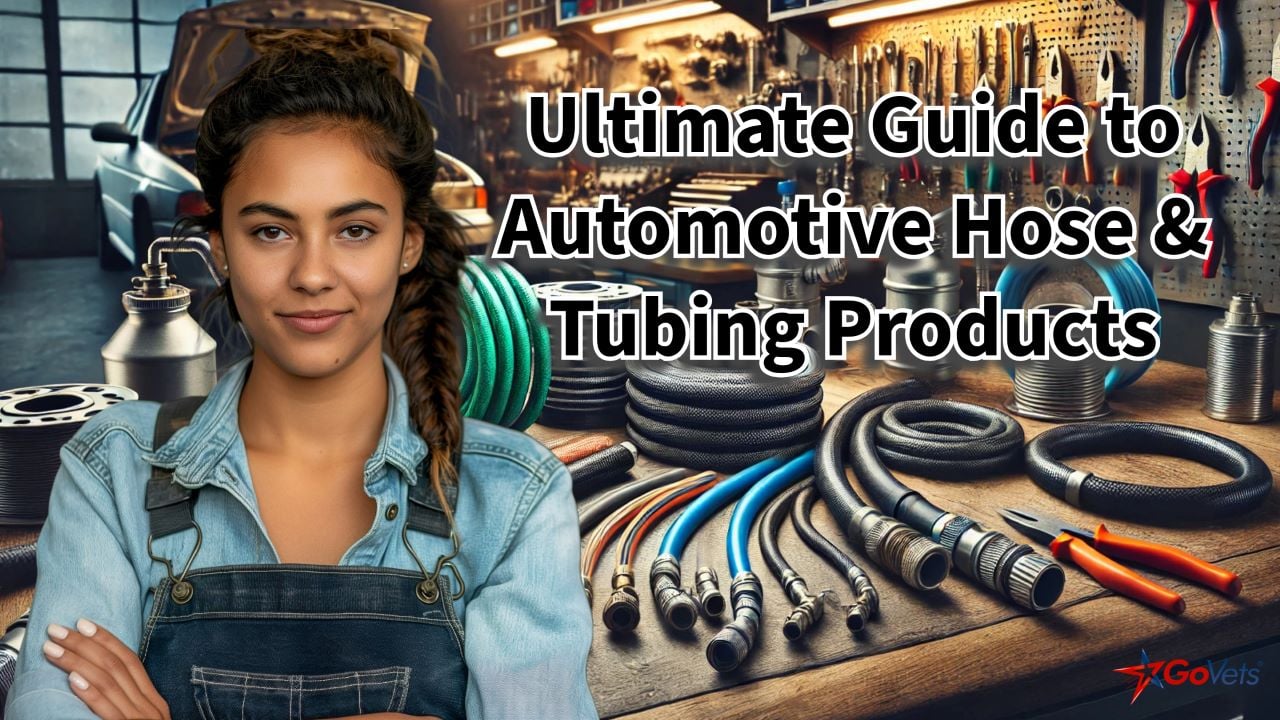 Ultimate Guide to Automotive Hose & Tubing Products - Girl mechanic - cross arms - smiling - auto-shop with hoses - govets