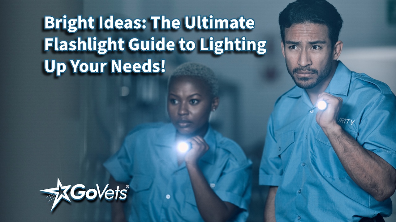 Two diverse security guards in blue uniforms with flashlights - appearing to search for something in the dark - guide to flashlights - govets