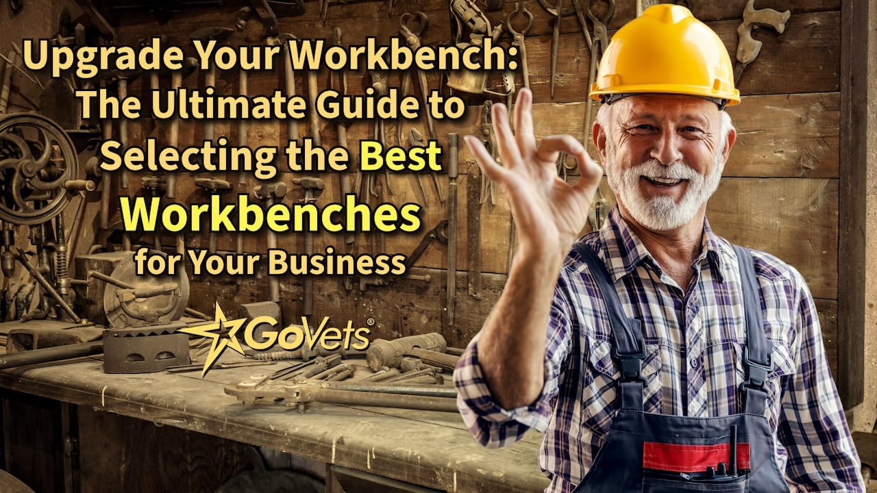 man in coveralls with yellow hard hat in front of all outdated workbench